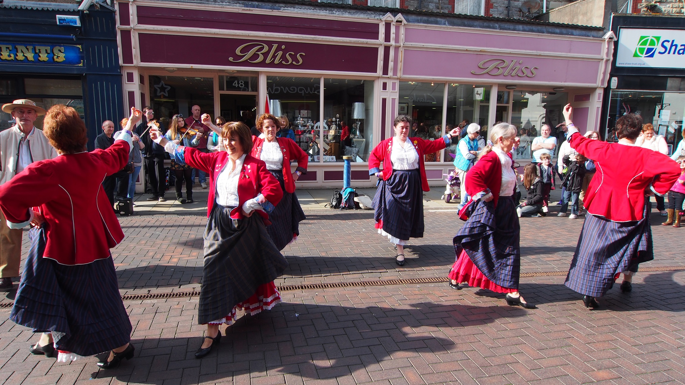 Some of the lady dancers performing in their traditional clothing